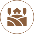 Farmhouse icon with trees and fields.